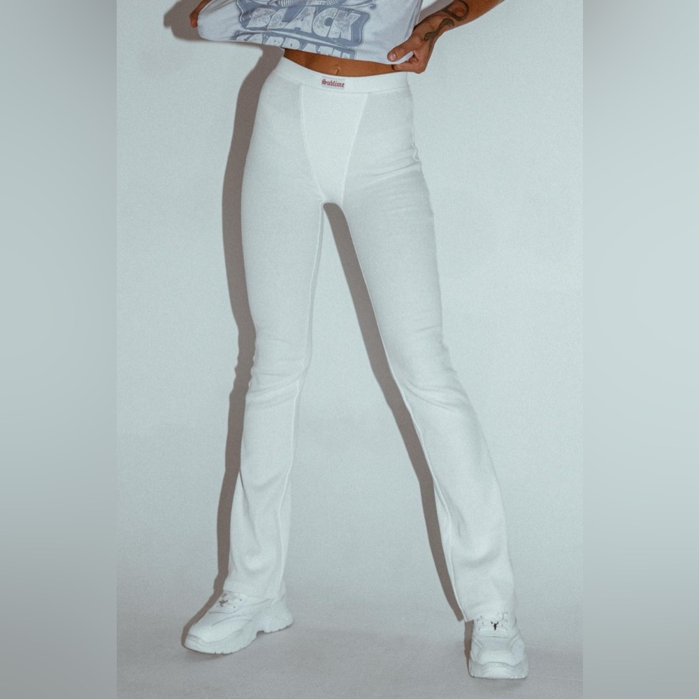 White flare pants